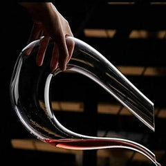 -shaped Wine DecanterCrystal U-shaped Wine DecanterProduct Description
Transform your wine-drinking experience with the Crystal U-Shaped Wine Decanter, a masterpiece of design and functionality. This 1500ml decanter CosmikCartShopper