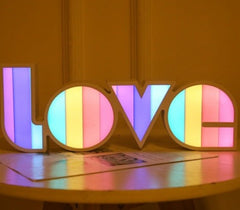 Girlfriend Birthday Wedding Party Decoration Romantic Wedding DecorValentine's Day LED LOVE Light Valentine's Day Gift For Girlfriend BirOverview:
 
 1.Lovely and simple design , the lamp shade is designed in rainbow style matching with "LOVE"word , a great room decorative lamp
 
 2.Made with high quaCosmikCartShopper